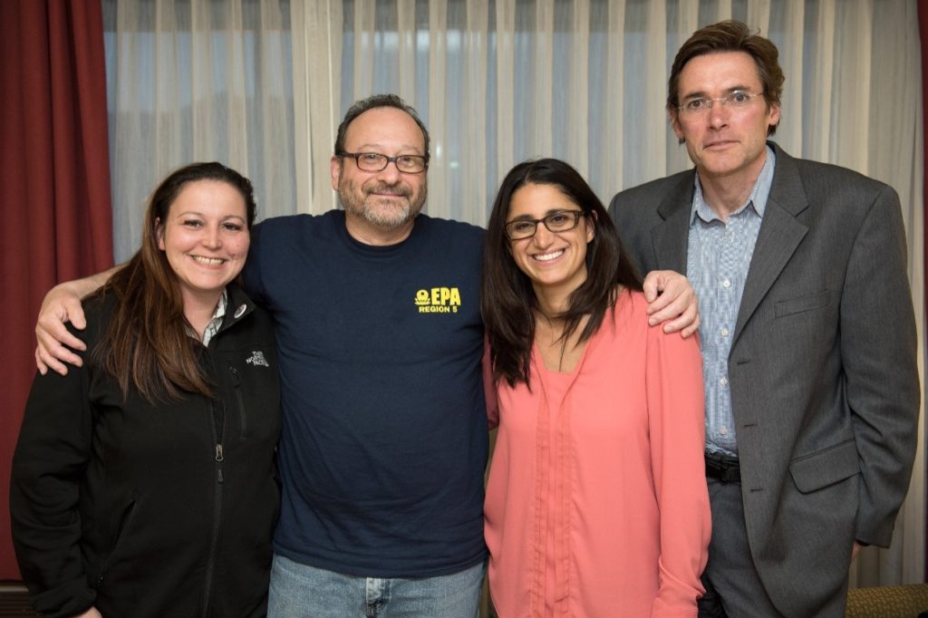 (From left) Former Flint resident Lee-Anne Walters, EPA regional regulations manager Miguel Del Toral, Hurley Medical Center pediatrician Mona Hanna-Attisha, and Virginia Tech Professor Marc Edwards pose for a photo in Flint. 